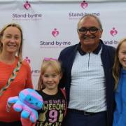 Stand-by-me patron Billy Byrne, from DIY SOS, with the Everett family from Stevenage.  Anna and Evie's dad, Scott, lost his battle with motor neurone disease in 2019.