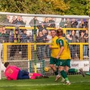 Jack Snelus and Hitchin Town celebrate after making it 2-0 against AFC Sudbury. Picture: PETER ELSE