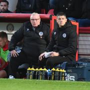 Steve Evans will probably hand control of the squad to Alex Revell and Paul Raynor. Picture: TGS PHOTO
