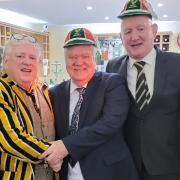 Letchworth rugby chairman Brian Burke hands special club claps to Max Boyce and John Walters. Picture: LETCHWORTH RFC