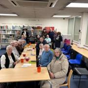 Ken Follett joins readers at Stevenage library's 'Tea & Chat' event.
