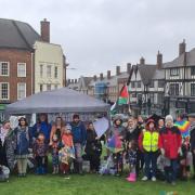 People braved the rain to gather on Windmill Hill for the kite-flying event in Hitchin.