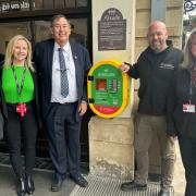 EHAAT Retail Team and Councillor Hone with the new Letchworth defibrillator