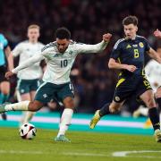Jamie Reid shoots for Northern Ireland against Scotland. Picture: ANDREW MILLIGAN/PA