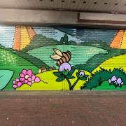 The mural, depicting the British countryside in spring, is designed to instil pride in residents and support local businesses.