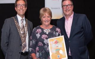 Susan Varvel, last year's Herts Advertiser Lifetime Achievement Award winner, presented by Alistair Woodgate president of St Albans District Chamber of Commerce. Picture: Cathy Benucci