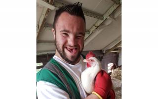 Co-Farmer Ed with one of the chickens at Church Farm Ardeley.