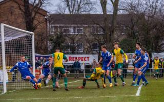 Bedford Town scramble an effort off the line against Hitchin Town. Picture: PETER ELSE