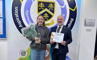 Kerry Mills with her award and James Crowther, headteacher of Hitchin Girls' School