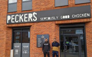 Sanjay and Rishi Chandarana outside Peckers existing store in Hitchin.