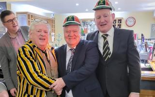 Letchworth rugby chairman Brian Burke hands special club claps to Max Boyce and John Walters. Picture: LETCHWORTH RFC