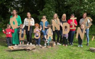 Staff and children celebrate an 'Outstanding' Ofsted rating